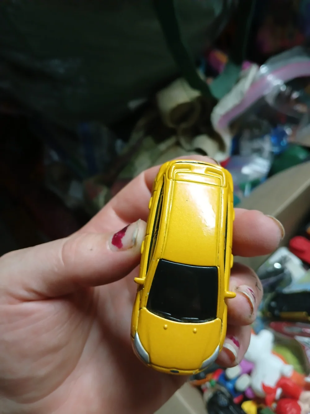 yellow 1:64 scale Maisto Ford Focus ST die-cast toy car